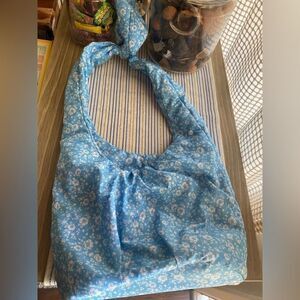 GANNI blue nylon bag with white flowers